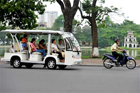 Hanoi, electric buggies, Hoan Kiem Lake, Quan Su Pagoda, Hoa Lo Prison