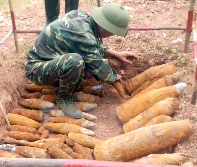 Chemical storage dump threatens HCMC residents, Two persons held for possession of marijuana, US officials explore mine consequence recovery in Quang Tri, Vietnamese students receive ASEAN scholarships