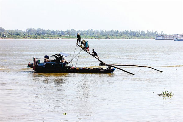 Linh fish, flooding season, Mekong Delta, Vietnam economy, Vietnamnet bridge, English news about Vietnam, Vietnam news, news about Vietnam, English news, Vietnamnet news, latest news on Vietnam, Vietnam