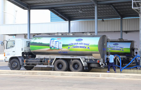 Trucks carry milk of the Vietnam Dairy Products JSC. The State Capital Investment Corporation will sell a 9 per cent stake in the dairy firm this year.