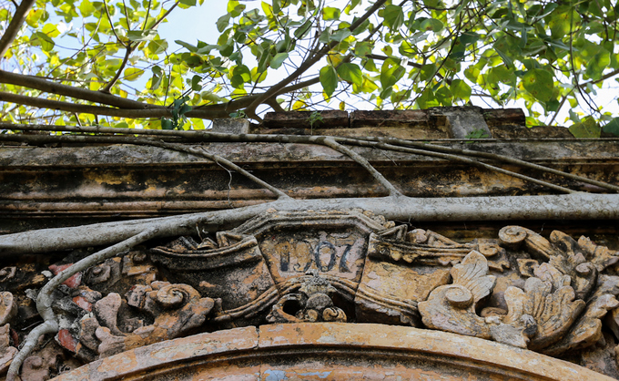 The ancient communal house inside Bodhi trees in Tien Giang, travel news, Vietnam guide, Vietnam airlines, Vietnam tour, tour Vietnam, Hanoi, ho chi minh city, Saigon, travelling to Vietnam, Vietnam travelling, Vietnam travel, vn news