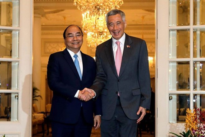 PM visits Vietnam’s pavilion at Food & Hotel Asia 2018 in Singapore, PM attends VN-Singapore Business Forum, French Communist Party leader welcomed in HCM City, ASEAN countries seek to foster mutual legal assistance in criminal matters