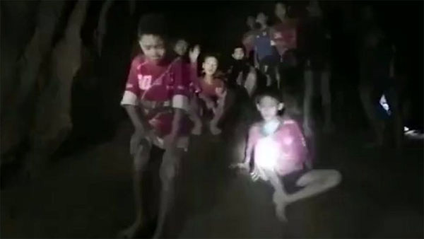 The boys trapped, Thai cave,  found by divers, still alive